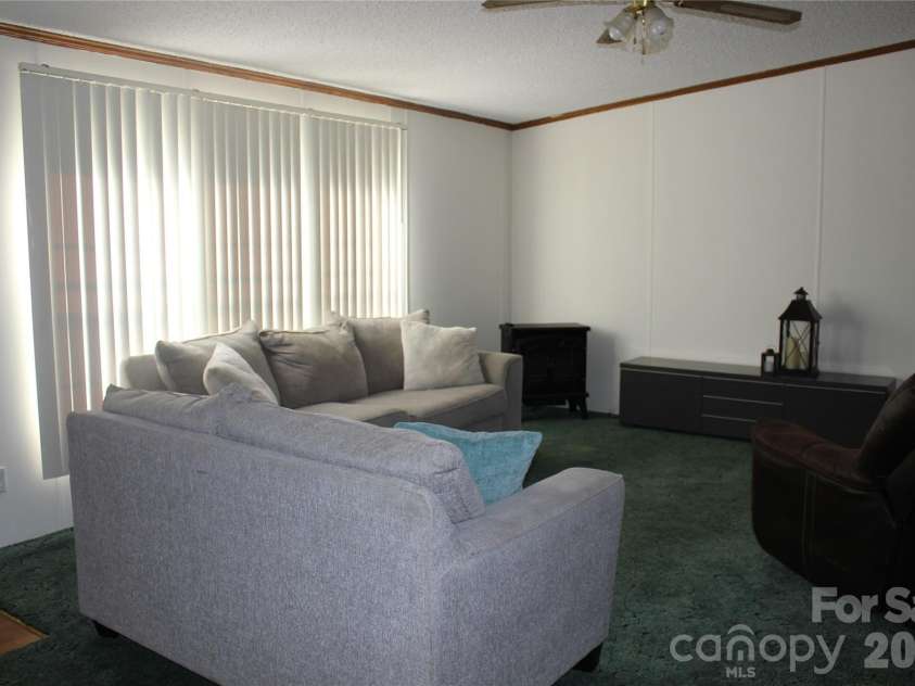 249 J L Green Lane, Pageland, SC 29728.  MLS# CAR4373064, YatesRealty ID 14676. Den