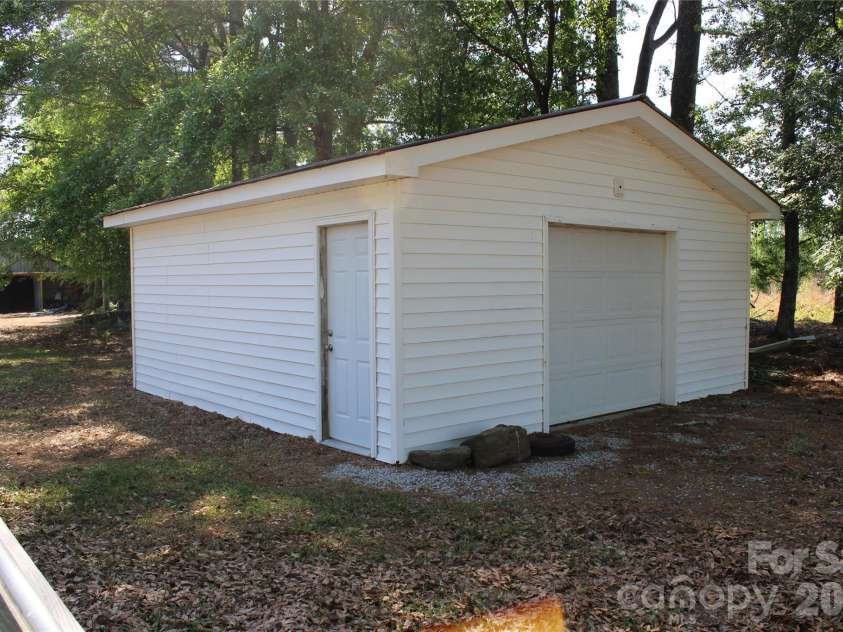 249 J L Green Lane, Pageland, SC 29728.  MLS# CAR4373064, YatesRealty ID 14676. Detached Garage