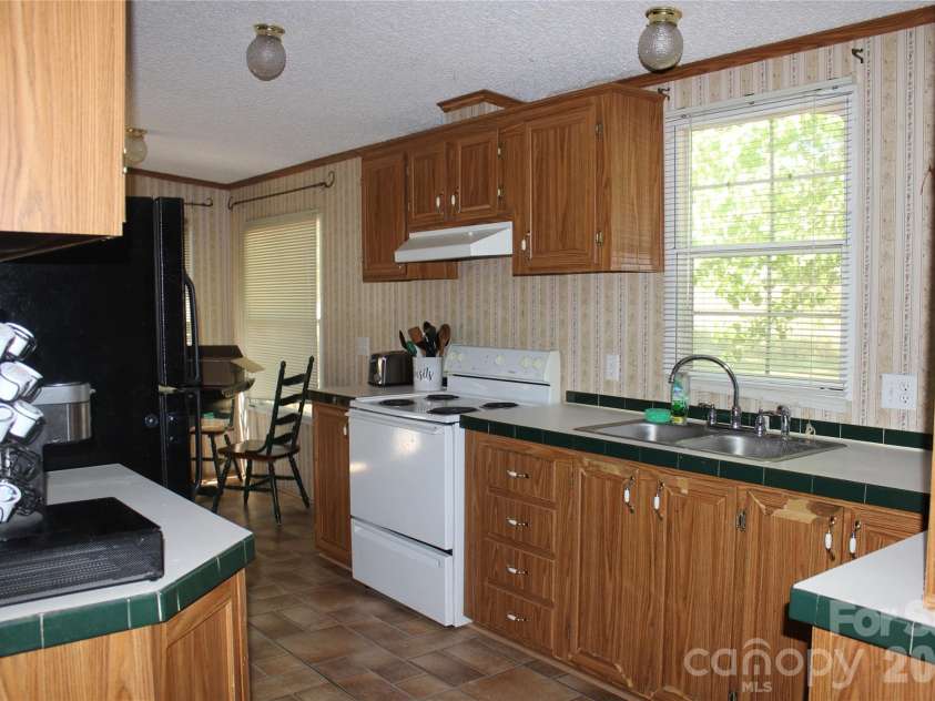 249 J L Green Lane, Pageland, SC 29728.  MLS# CAR4373064, YatesRealty ID 14676. Kitchen