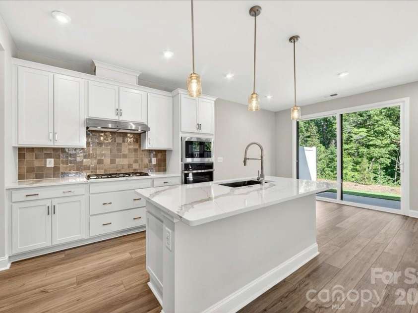 183 Landy Street, Fort Mill, SC 29715.  MLS# CAR4360547, YatesRealty ID 14679. Light filled gourmet kitchen