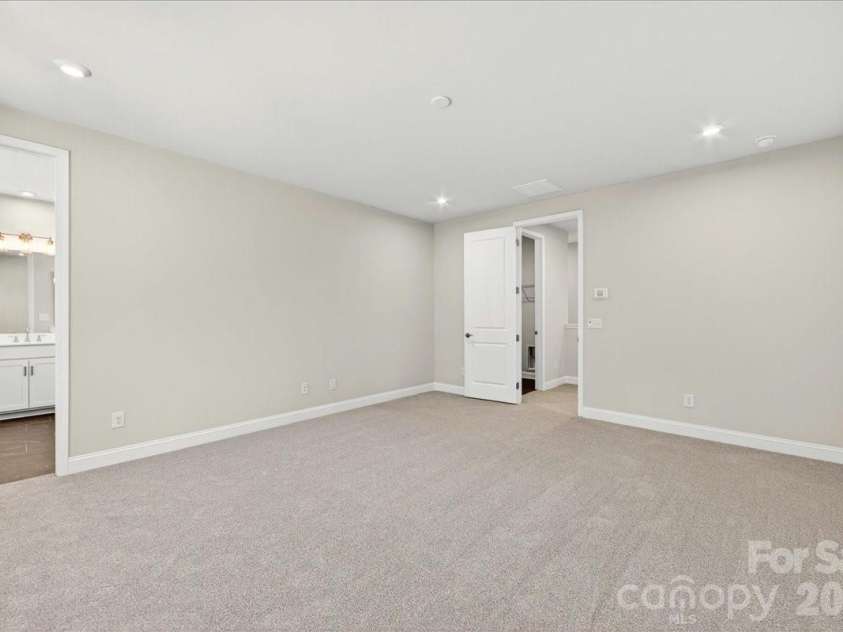 183 Landy Street, Fort Mill, SC 29715.  MLS# CAR4360547, YatesRealty ID 14679. Light filled primary 