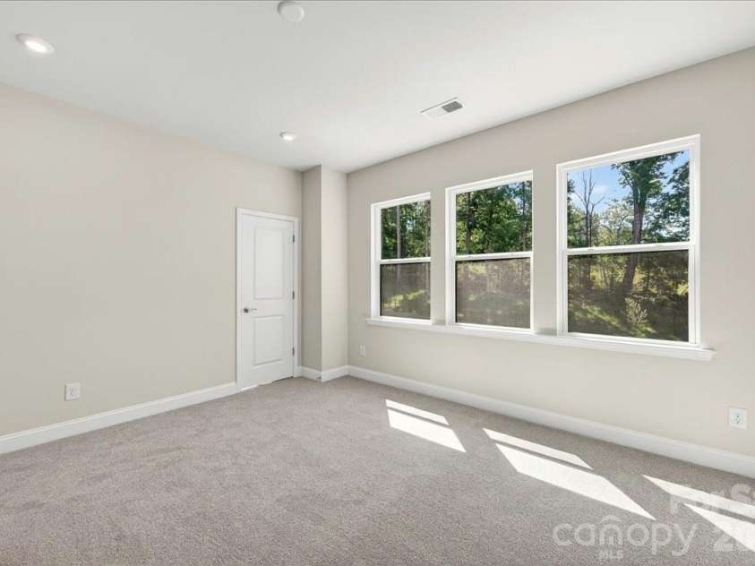 183 Landy Street, Fort Mill, SC 29715.  MLS# CAR4360547, YatesRealty ID 14679. Light filled Third bedroom