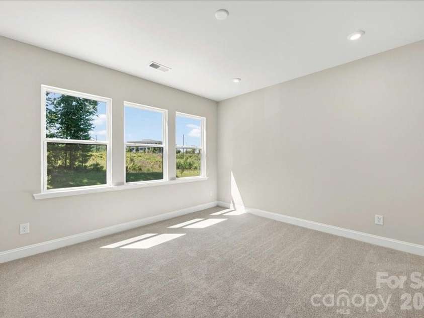 183 Landy Street, Fort Mill, SC 29715.  MLS# CAR4360547, YatesRealty ID 14679. Light filled Third bedroom