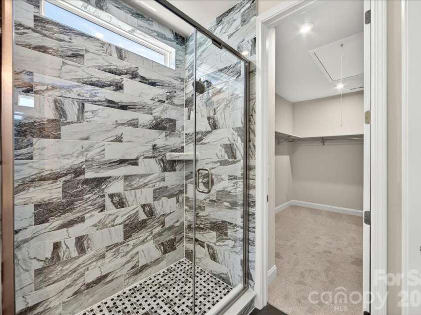 183 Landy Street, Fort Mill, SC 29715.  MLS# CAR4360547, YatesRealty ID 14679. Primary tiled walk-in shower
