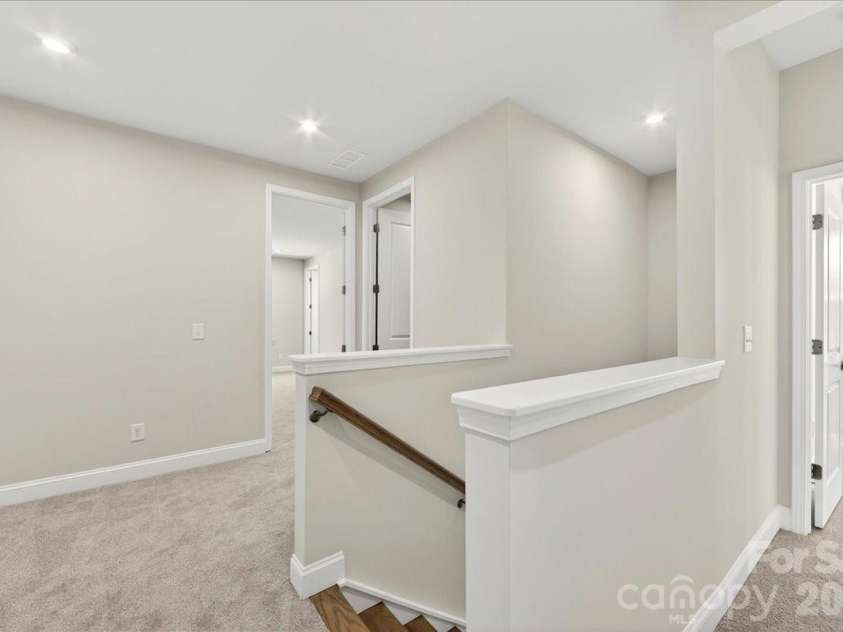 183 Landy Street, Fort Mill, SC 29715.  MLS# CAR4360547, YatesRealty ID 14679. Second floor landing 