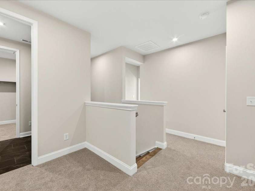 183 Landy Street, Fort Mill, SC 29715.  MLS# CAR4360547, YatesRealty ID 14679. Second floor landing and Laundry room
