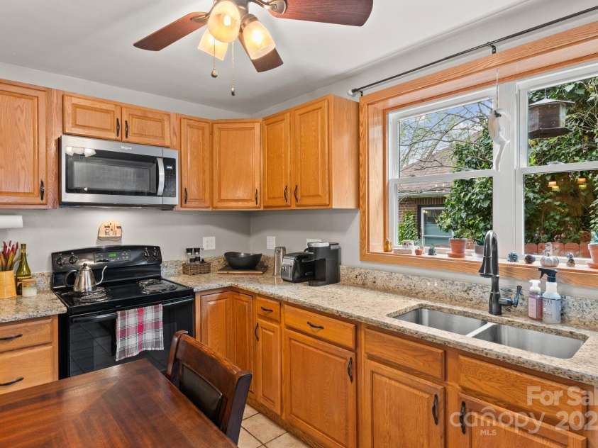 24 Enka Orchard Street, Candler, NC 28715.  MLS# CAR4249534, YatesRealty ID 14679. 