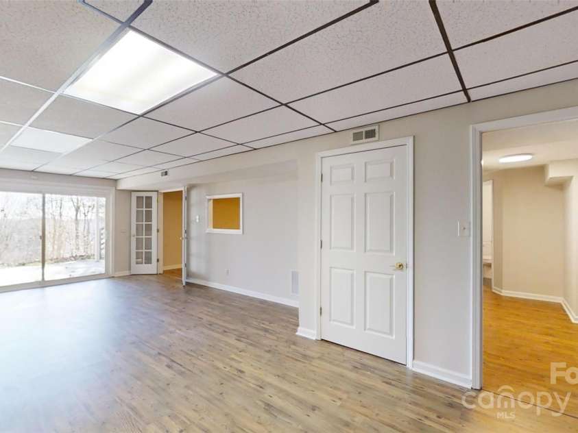 23 Moriah Lane, Asheville, NC 28803.  MLS# CAR4221443, YatesRealty ID 1468. Additional storage, half bathroom and mechanical in basement.