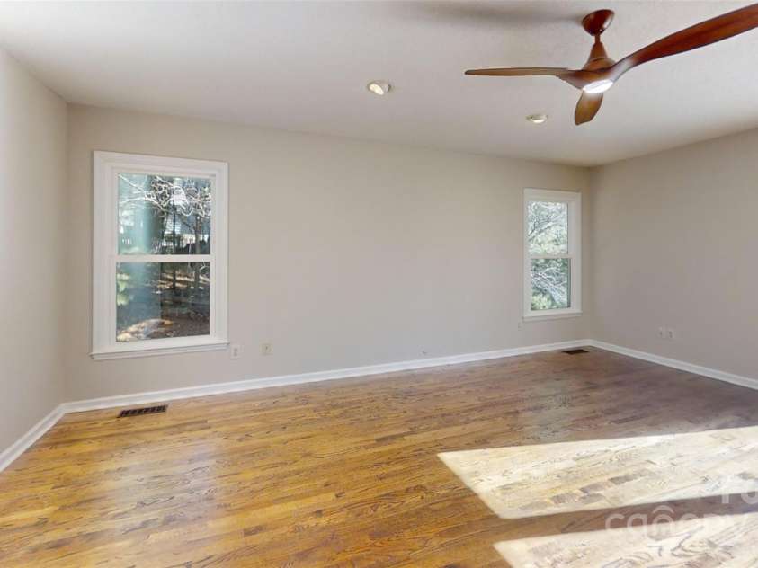 23 Moriah Lane, Asheville, NC 28803.  MLS# CAR4221443, YatesRealty ID 1468. Light-filled Living Room.