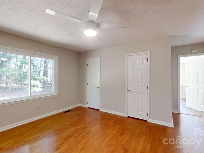 23 Moriah Lane, Asheville, NC 28803.  MLS# CAR4221443, YatesRealty ID 1468. Primary Bedroom off of living room.