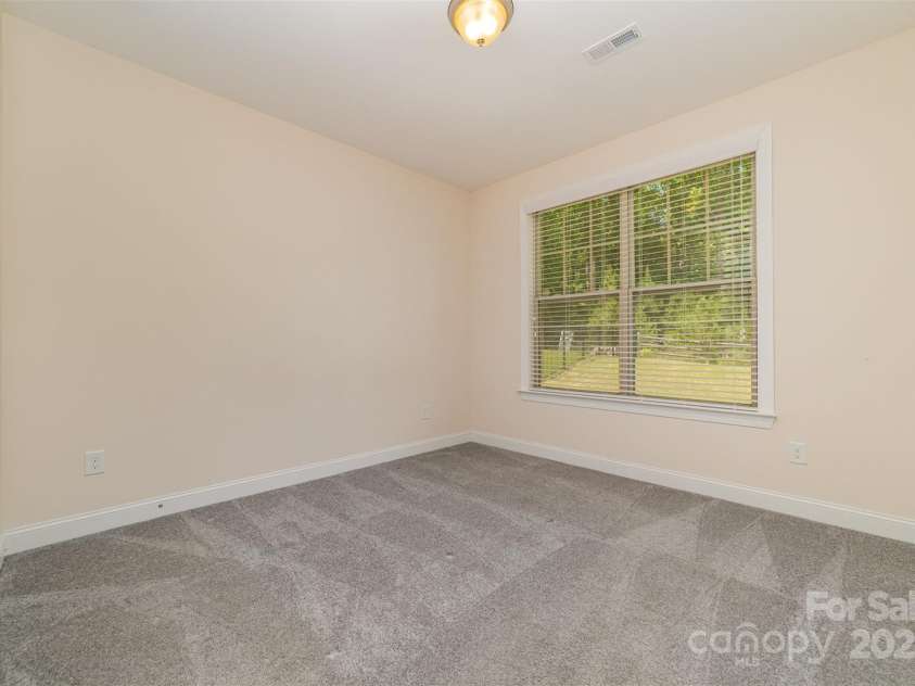 15536 Oleander Drive, Charlotte, NC 28278.  MLS# CAR4257149, YatesRealty ID 14685. Downstairs Bedroom
