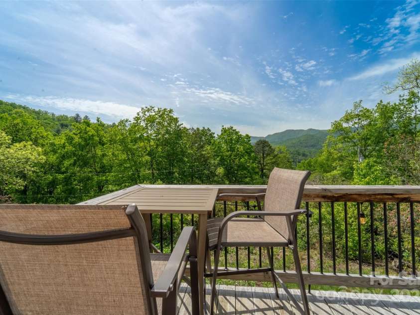 354 Ivy Ridge Circle, Sylva, NC 29779.  MLS# CAR4262609, YatesRealty ID 14687. Cottage - Deck off Kitchen