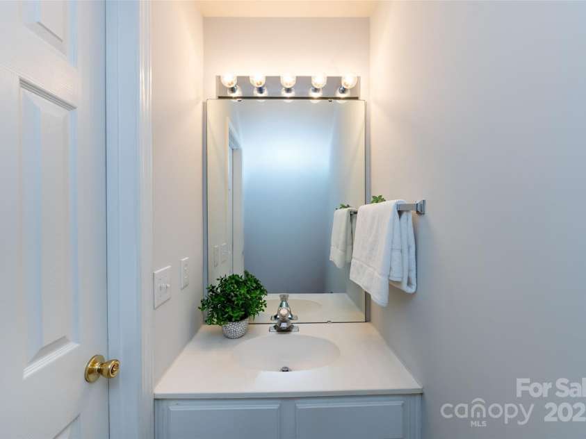 8040 Flanders Street, Charlotte, NC 28277.  MLS# CAR4256600, YatesRealty ID 14697. Powder room downstairs