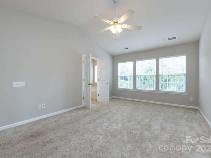 8040 Flanders Street, Charlotte, NC 28277.  MLS# CAR4256600, YatesRealty ID 14697. Primary Bedroom w Vaulted Ceilings