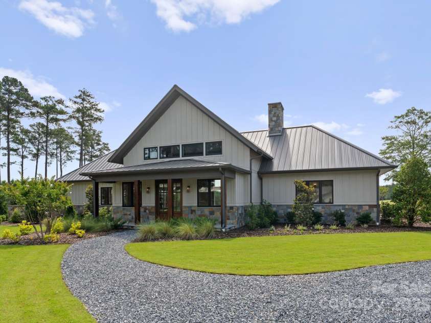 3759 NC 24/27 Highway, Cameron, NC 28326.  MLS# CAR4277323, YatesRealty ID 147. Front Elevation Of The Hunting Lodge