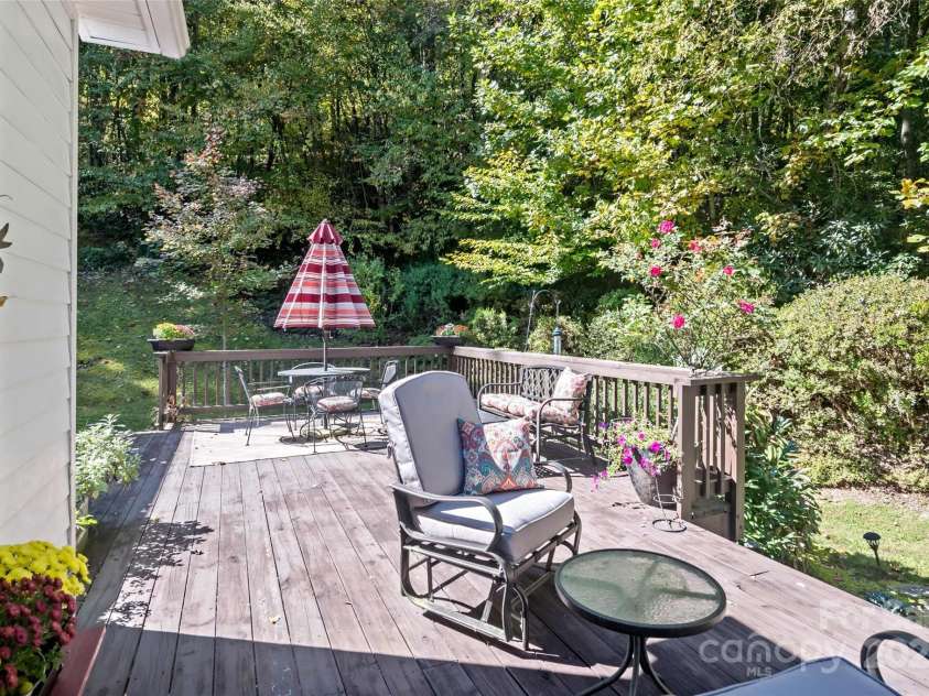 5580 Greenville Highway, Brevard, NC 28712.  MLS# CAR4196657, YatesRealty ID 147. Private back deck