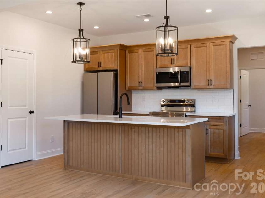 1909 Friendly Lane, Newton, NC 28658.  MLS# CAR4371462, YatesRealty ID 14703. Kitchen w/ Pantry