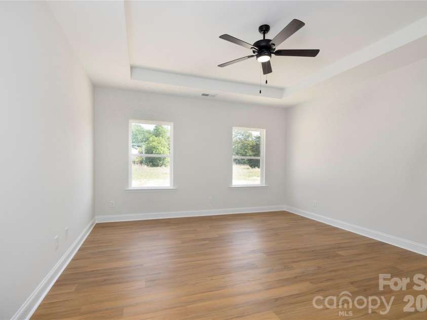 1909 Friendly Lane, Newton, NC 28658.  MLS# CAR4371462, YatesRealty ID 14703. Main Floor Primary Bedroom