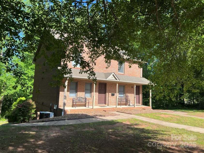 116 Fairview Street, Shelby, NC 28152.  MLS# CAR4252244, YatesRealty ID 14706. The building offers a nice flat yard and front covered porch.