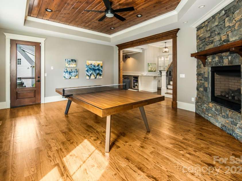 14 Twinflower Trail, Asheville, NC 28804.  MLS# CAR4231774, YatesRealty ID 14707. Family room on lower level