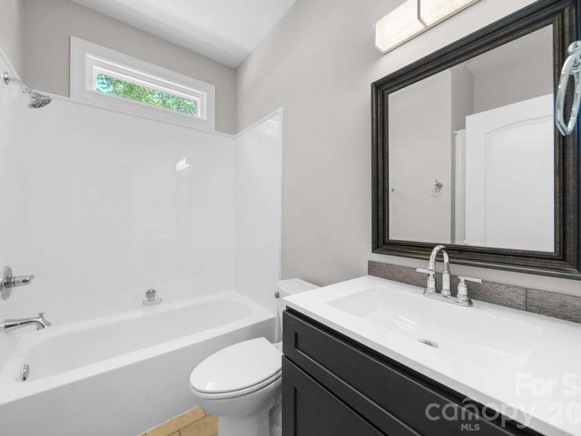 169 Winding Creek Drive, Troutman, NC 28166.  MLS# CAR4323292, YatesRealty ID 14707. 1st Floor Bath #2