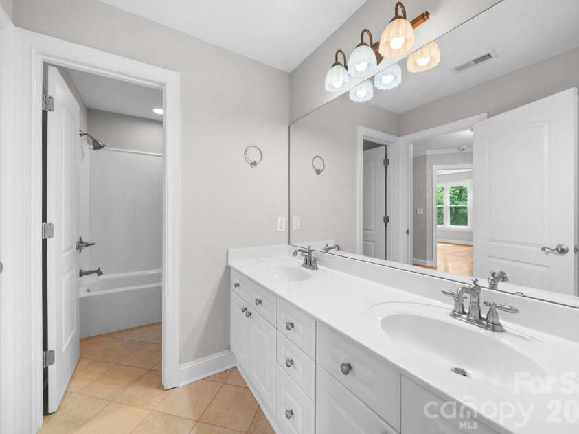 169 Winding Creek Drive, Troutman, NC 28166.  MLS# CAR4323292, YatesRealty ID 14707. 2nd Floor Bathroom #3