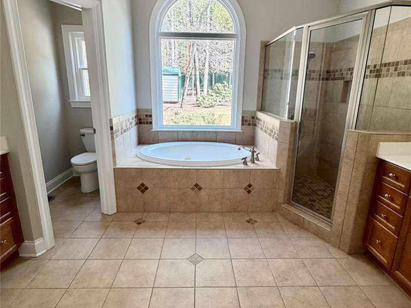 169 Winding Creek Drive, Troutman, NC 28166.  MLS# CAR4323292, YatesRealty ID 14707. Master Bath