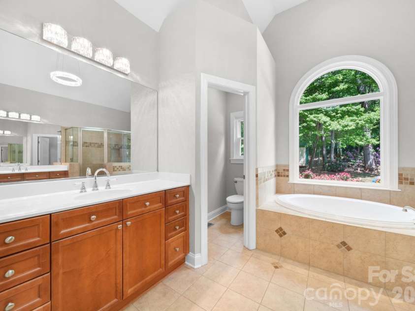 169 Winding Creek Drive, Troutman, NC 28166.  MLS# CAR4323292, YatesRealty ID 14707. Master Bathroom