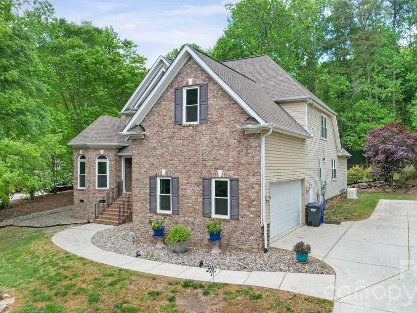 169 Winding Creek Drive, Troutman, NC 28166.  MLS# CAR4323292, YatesRealty ID 14707. Side View