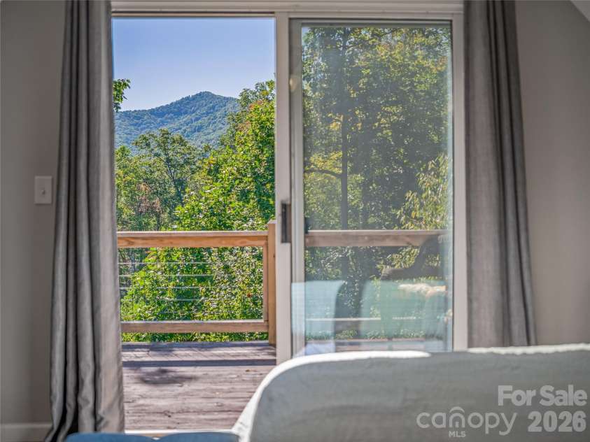 382 Black Oak Cove Road, Candler, NC 28715.  MLS# CAR4310781, YatesRealty ID 14709. 