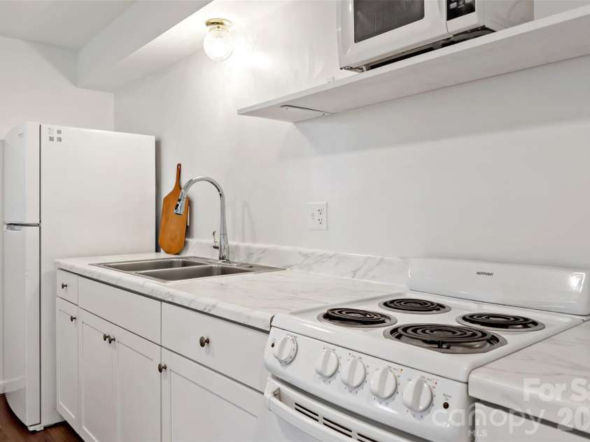29 Alexander Street, Black Mountain, NC 28711.  MLS# CAR4329485, YatesRealty ID 14711. Basement Apartment