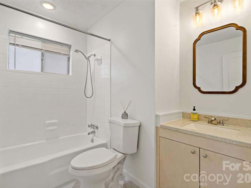 29 Alexander Street, Black Mountain, NC 28711.  MLS# CAR4329485, YatesRealty ID 14711. Main Level Guest Bathroom