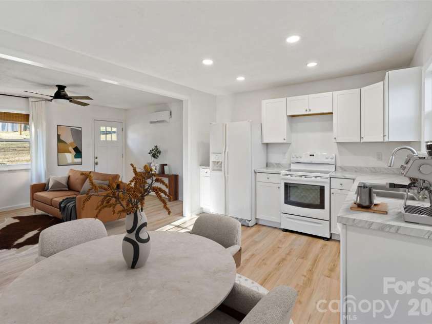 29 Alexander Street, Black Mountain, NC 28711.  MLS# CAR4329485, YatesRealty ID 14711. Virtually Staged Living Room / Dining Area