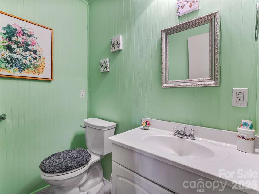 29 Tall Oaks Road, Candler, NC 28715.  MLS# CAR4333653, YatesRealty ID 14716. Main level  1/2 bath