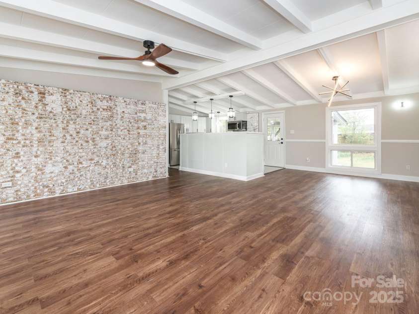 5426 Milford Road, Charlotte, NC 28210.  MLS# CAR4237264, YatesRealty ID 14716. Living Room and Dining Area