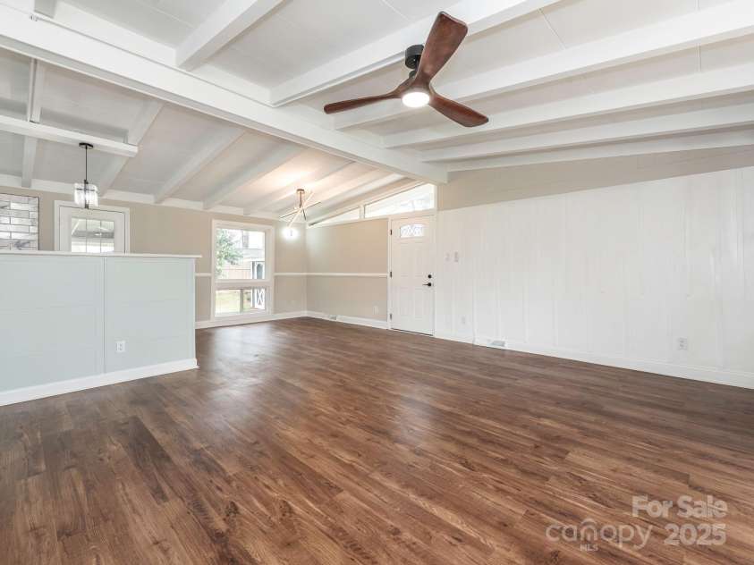 5426 Milford Road, Charlotte, NC 28210.  MLS# CAR4237264, YatesRealty ID 14716. Living Room and Dining Area