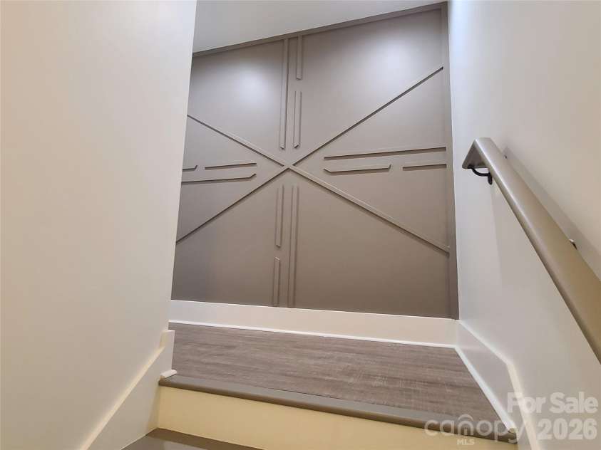 444 19th Avenue Circle, Hickory, NC 28601.  MLS# CAR4187456, YatesRealty ID 14718. Accent wall on landing to downstairs