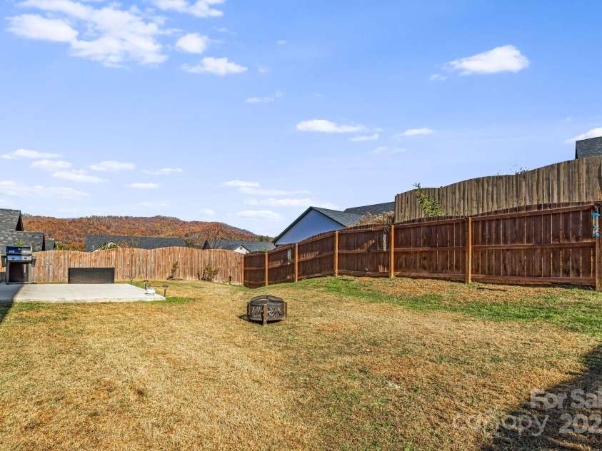 504 Rosebud Orchid Way, Weaverville, NC 28787.  MLS# CAR4318464, YatesRealty ID 14719. Big Beautiful Backyard with Long Range Mountain Views - Fall WNC Colors, grill a steak and sit by a firepit....Life is Good!