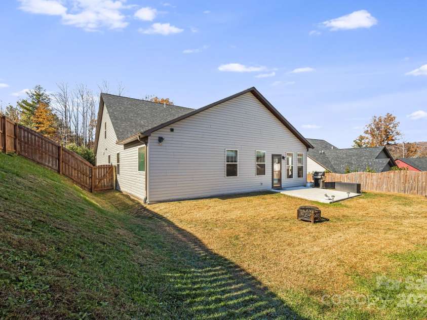504 Rosebud Orchid Way, Weaverville, NC 28787.  MLS# CAR4318464, YatesRealty ID 14719. Large future terraced garden spot??
