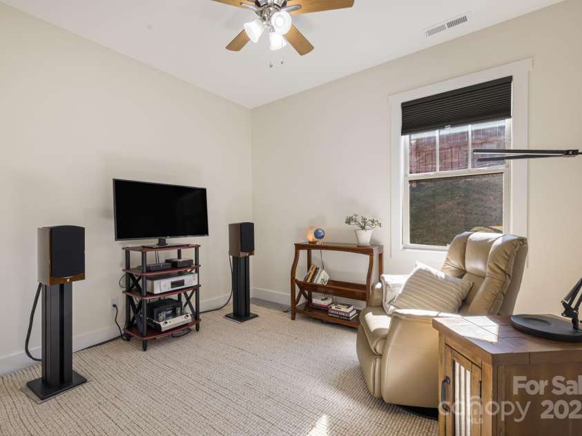 504 Rosebud Orchid Way, Weaverville, NC 28787.  MLS# CAR4318464, YatesRealty ID 14719. Lower Level Bedroom 2 or Office -Remember the Maxell Cassette Commercial??