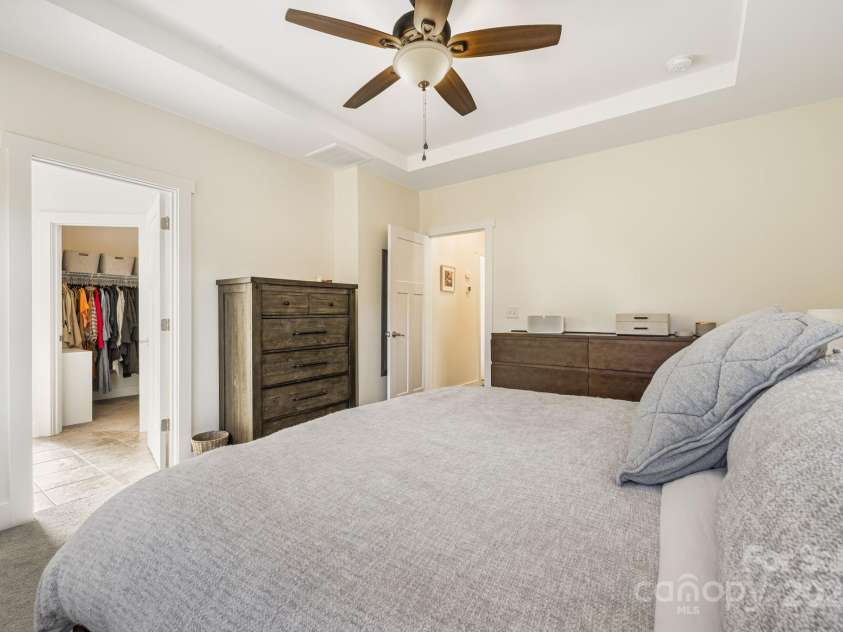 504 Rosebud Orchid Way, Weaverville, NC 28787.  MLS# CAR4318464, YatesRealty ID 14719. Lower Primary Suite with Tray/Recessed Ceiling and Can lighting