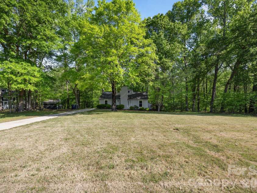 5979 Tall Tree Lane, Harrisburg, NC 28075.  MLS# CAR4370222, YatesRealty ID 14722. 