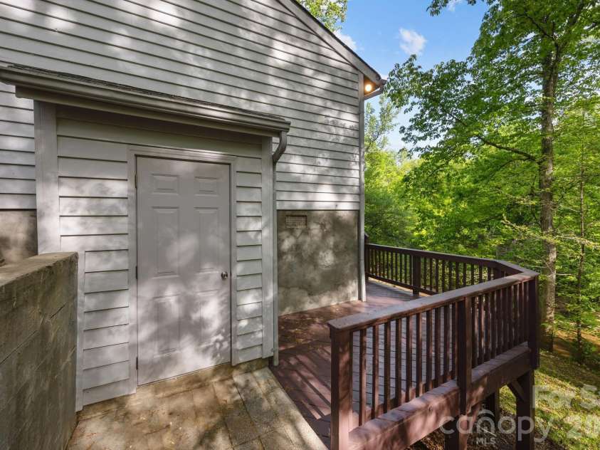 5979 Tall Tree Lane, Harrisburg, NC 28075.  MLS# CAR4370222, YatesRealty ID 14722. Exterior access to walk-in crawlspace - so much space for storage or a workshop area