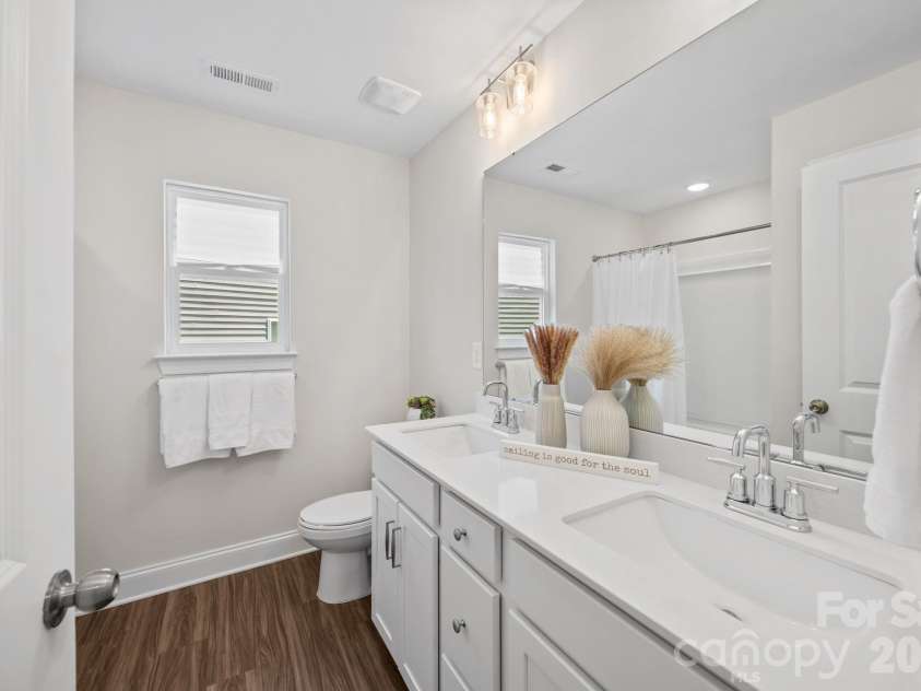154 Cotton Field Drive, Statesville, NC 28677.  MLS# CAR4358774, YatesRealty ID 14724. Guest bathroom