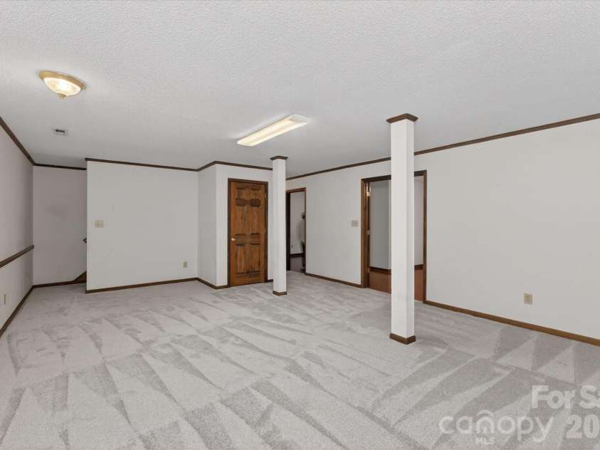 8149 Shannon Woods Lane, Matthews, NC 28104.  MLS# CAR4371130, YatesRealty ID 14728. Basement