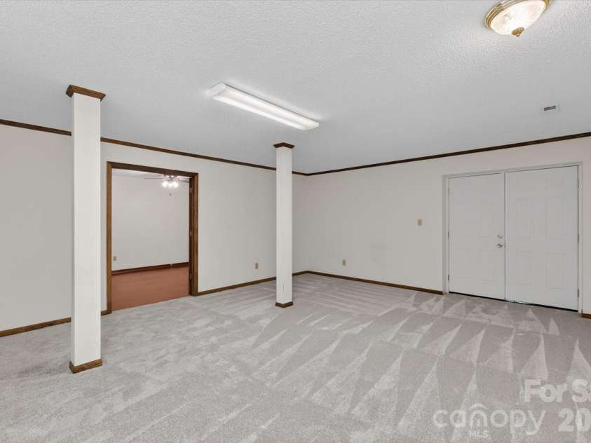 8149 Shannon Woods Lane, Matthews, NC 28104.  MLS# CAR4371130, YatesRealty ID 14728. Basement