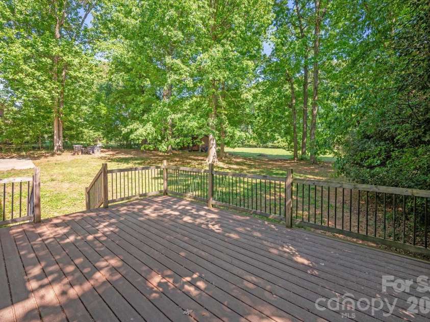 8149 Shannon Woods Lane, Matthews, NC 28104.  MLS# CAR4371130, YatesRealty ID 14728. Deck