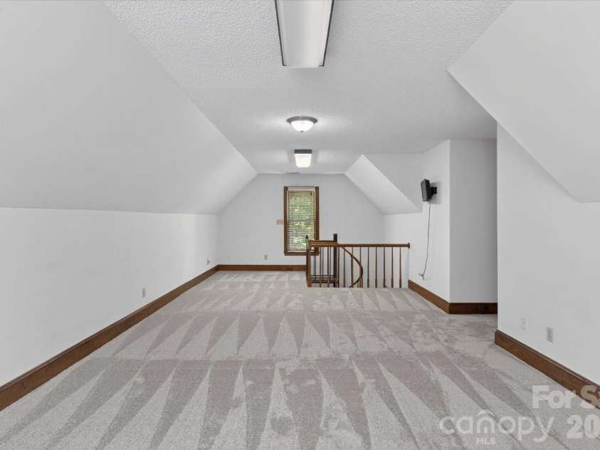 8149 Shannon Woods Lane, Matthews, NC 28104.  MLS# CAR4371130, YatesRealty ID 14728. Loft