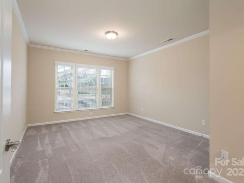 3087 Bartlett Street, Fort Mill, SC 29715.  MLS# CAR4177276, YatesRealty ID 14730. Front Bedroom Main Level