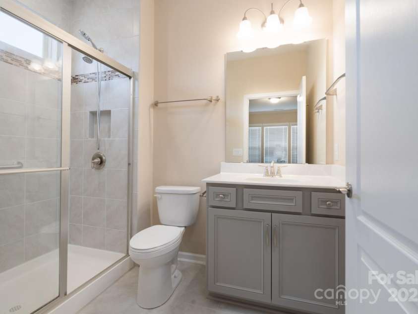 3087 Bartlett Street, Fort Mill, SC 29715.  MLS# CAR4177276, YatesRealty ID 14730. Front Bedroom's Full Bathroom